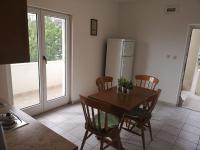 Kuchyň nebo kuchyňský kout v ubytování Anic Apartments Stanići