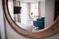 Hotel Szerokie Wody Sea & Sand Ustkaにあるテレビまたはエンターテインメントセンター