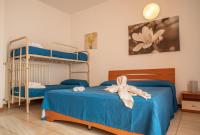 A bed or beds in a room at Residence Nobel