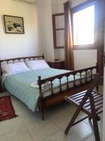 Postel nebo postele na pokoji v ubytování Pericles Traditional Cretan Home