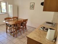 Kuchyň nebo kuchyňský kout v ubytování Anic Apartments Stanići
