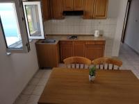 Kuchyň nebo kuchyňský kout v ubytování Anic Apartments Stanići