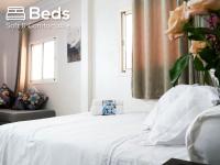 Ένα ή περισσότερα κρεβάτια σε δωμάτιο στο Ayouz House Hotel