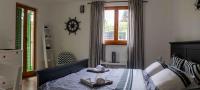 Posteľ alebo postele v izbe v ubytovaní Apartments in Zadar - Zadar Riviera 40411