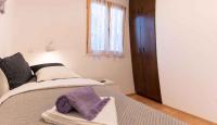 Posteľ alebo postele v izbe v ubytovaní Apartments in Zadar - Zadar Riviera 40411