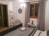 Posteľ alebo postele v izbe v ubytovaní Apartments in Zadar - Zadar Riviera 40411