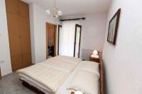 Posteľ alebo postele v izbe v ubytovaní Apartment in Crikvenica 39335