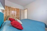 Posteľ alebo postele v izbe v ubytovaní Apartments in Peroj/Istrien 34288