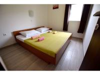 Posteľ alebo postele v izbe v ubytovaní Apartments in Starigrad-Paklenica 35542