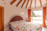 Postel nebo postele na pokoji v ubytování Villa Oasis - Costa CarpeDiem