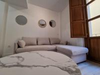 Posezení v ubytování GLORIA SUITES