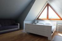 Posteľ alebo postele v izbe v ubytovaní Apartament Bajkowy & Dwupoziomowy Krzesany