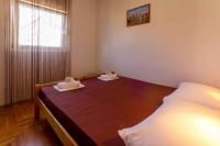 Posteľ alebo postele v izbe v ubytovaní One-Bedroom Apartment in Crikvenica LXXIX