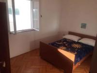 Postel nebo postele na pokoji v ubytování Apartment in Starigrad-Paklenica 6806
