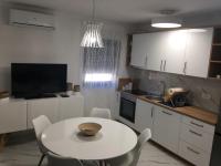 Kuchyň nebo kuchyňský kout v ubytování Apartmani Zlata