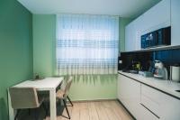 Kuchyňa alebo kuchynka v ubytovaní The Place Apartments Hebrangova