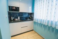 Kuchyňa alebo kuchynka v ubytovaní The Place Apartments Hebrangova