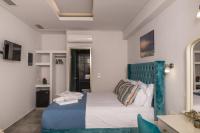 Postel nebo postele na pokoji v ubytování Denise Beach Hotel