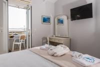 Postel nebo postele na pokoji v ubytování Denise Beach Hotel
