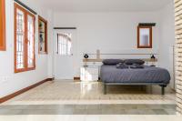 A bed or beds in a room at Casa Po