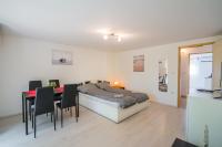 Posteľ alebo postele v izbe v ubytovaní Zigzag Apartman