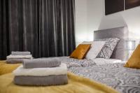 Posteľ alebo postele v izbe v ubytovaní Warehouse apartment Zadar