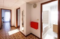 A bed or beds in a room at Appartamento Calmo 3SX