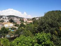 a view of a city with trees and buildings at Studio with large balcony and nice view by Weekome in Vallauris