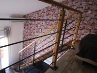 a staircase in a room with a brick wall at Studio with large balcony and nice view by Weekome in Vallauris