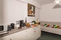 Kuchyň nebo kuchyňský kout v ubytování Denise Beach Hotel