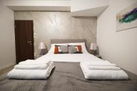 Posteľ alebo postele v izbe v ubytovaní Beachfront Apartments and Rooms