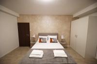 Posteľ alebo postele v izbe v ubytovaní Beachfront Apartments and Rooms