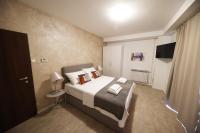 Posteľ alebo postele v izbe v ubytovaní Beachfront Apartments and Rooms