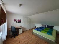 Łóżko lub łóżka w pokoju w obiekcie Nyíl Apartman wellnes