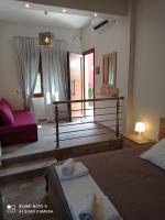 Posteľ alebo postele v izbe v ubytovaní Ethra luxury studios
