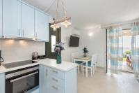 A kitchen or kitchenette at Waves Apartments Melody Glyfada