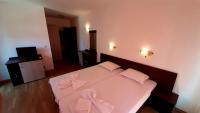 Postel nebo postele na pokoji v ubytování Adri Guest House