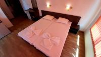Postel nebo postele na pokoji v ubytování Adri Guest House