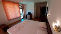 Postel nebo postele na pokoji v ubytování Adri Guest House