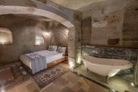 Sarnich Cave Suitesにあるベッド