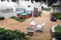 A garden outside BUGANVILLA MOLINO