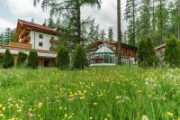 Ein Garten an der Unterkunft Naturhotel Lärchenhof