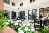 Patio alebo iná vonkajšia časť ubytovania Hotel De Plam