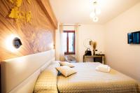 Posteľ alebo postele v izbe v ubytovaní Bellevue - Rooms & Suites