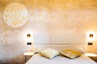 Posteľ alebo postele v izbe v ubytovaní Bellevue - Rooms & Suites