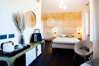 Posteľ alebo postele v izbe v ubytovaní Bellevue - Rooms & Suites