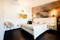 Posteľ alebo postele v izbe v ubytovaní Bellevue - Rooms & Suites