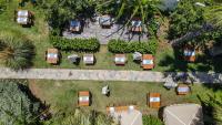 A garden outside La Brezza Suite & Hotel