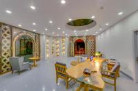 A seating area at La Brezza Suite & Hotel