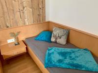 A bed or beds in a room at Apart Haus Bella